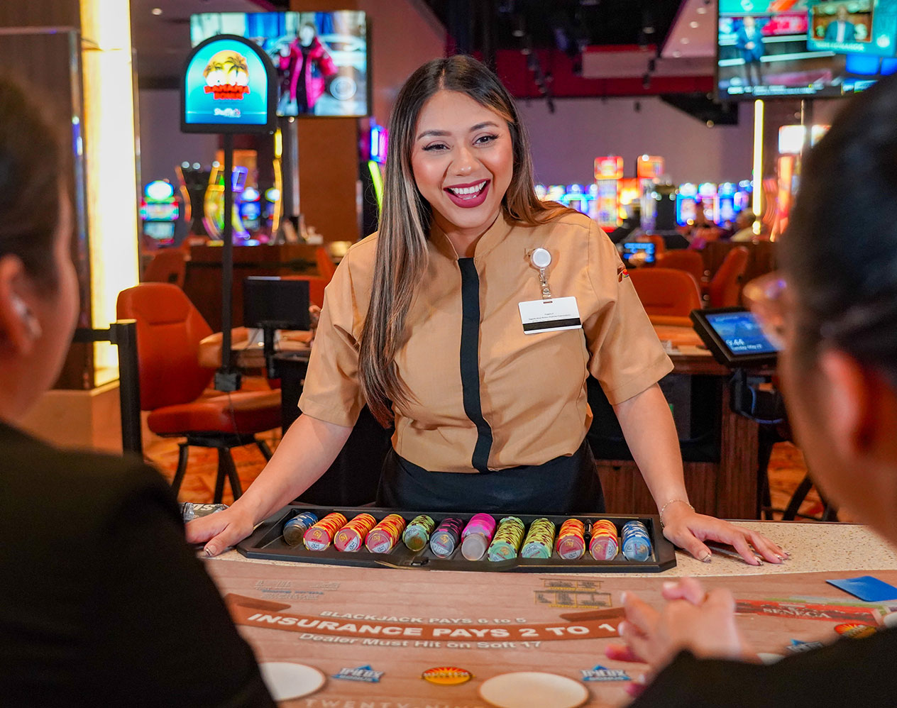 blackjack dealer on the casino gaming floor